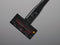Compact handheld brush