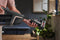 Compact handheld brush