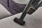 Compact handheld brush