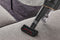 Compact handheld brush