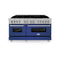 60 In. 7.4 Cu. Ft. Legacy Dual Fuel Range With 9 Burner Gas Cooktop And 2 Electric Convection Ovens In Satin Stainless Steel And Blue Matte Doors