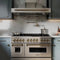 Autograph Edition 48 In. 6.0 Cu. Ft. Legacy Dual Fuel Range With 7 Burner Gas Cooktop And 2 Electric Ovens In Stainless Steel And Champagne Bronze Accents