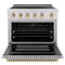 Autograph Edition 36 In. 5.2 Cu. Ft. Paramount Induction Range With 5 Element Cooktop And Electric Convection Oven In Stainless Steel With Champagne Bronze Helix Handle And Knob Accents