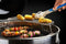 napoleon-bbq-71022-warming-rack-for-charcoal-kettle-grills-for-charcoal-kettle-grills – Studio Shot