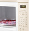 GE Appliances JVM3160DFCC Over The Range Microwaves Bisque – Lifestyle Photo