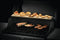 napoleon-bbq-70044-warming-rack-baking-stone-fits-rogue-425-and-larger-grills – Official Product Photo