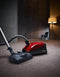 Miele CLASSICC1HOMECAREPOWERLINESBCN0AR Canister Vacuums Autumn Red – Lifestyle Photo