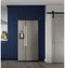 GE Appliances GSS23GMPES Side By Side Refrigerators Fingerprint Resistant Slate – Lifestyle Photo