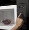 GE Appliances JVM3160DFBB Over The Range Microwaves Black – Lifestyle Photo