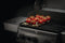 napoleon-bbq-56426-enameled-cast-iron-reversible-griddle-for-rogue-425-model-grills – Official Product Photo
